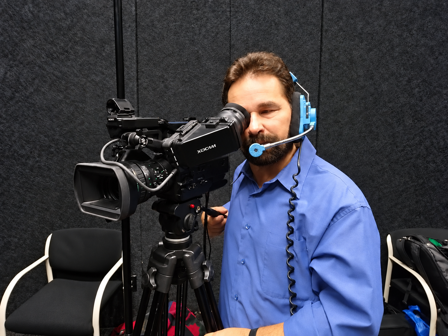 Jo operating a television camera